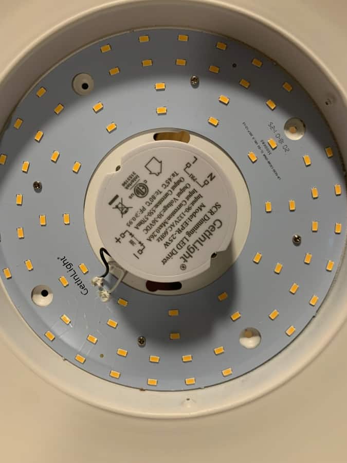 Inside of light fixture showing screw attachment sites